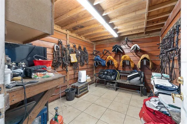 a view of yard with green space and seating