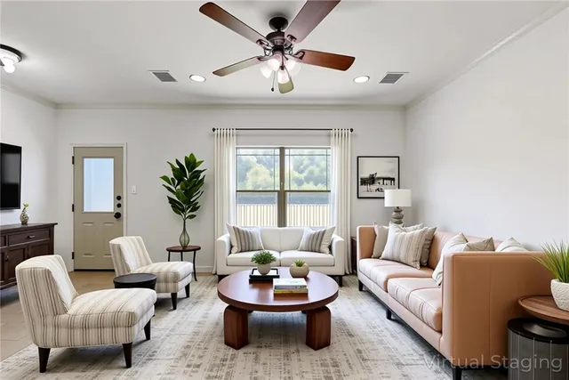 a living room with furniture and a large window