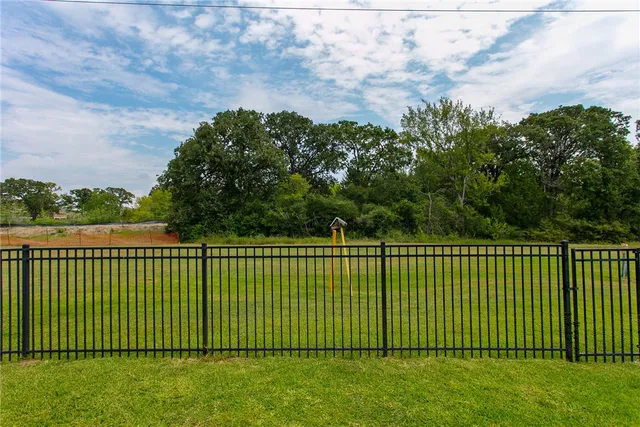 a view of a balcony with a garden