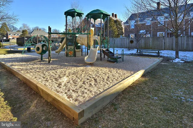 a front view of a building with garden