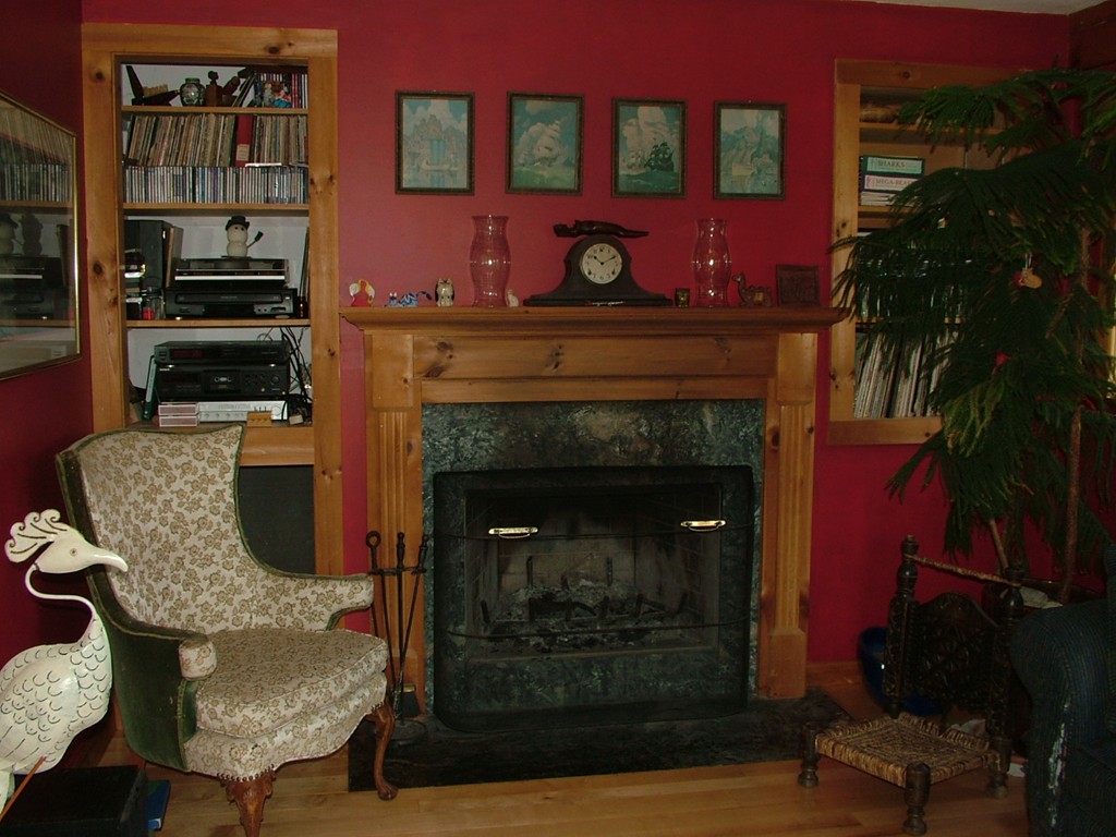 65 Potter Road Rowe, MA 01367 - Photo 12 of 30 a view of a livingroom with furniture and a fireplace