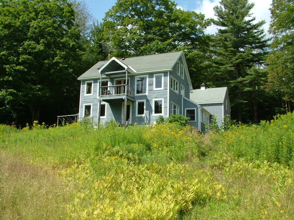 65 Potter Road Rowe, MA 01367 - Photo 2 of 30 a house view with a garden space