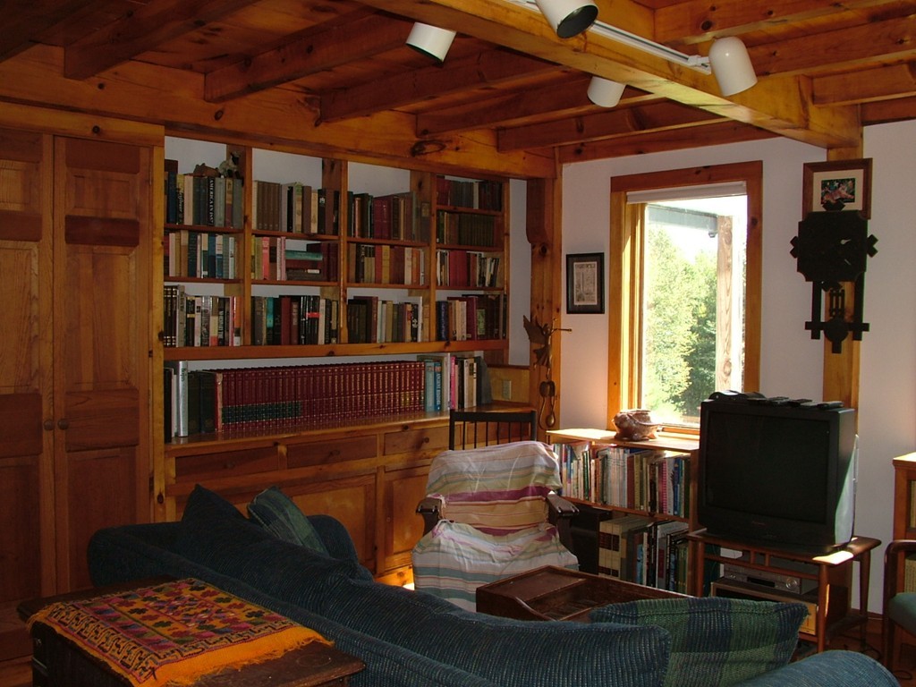 65 Potter Road Rowe, MA 01367 - Photo 21 of 30 a living room with furniture and a window