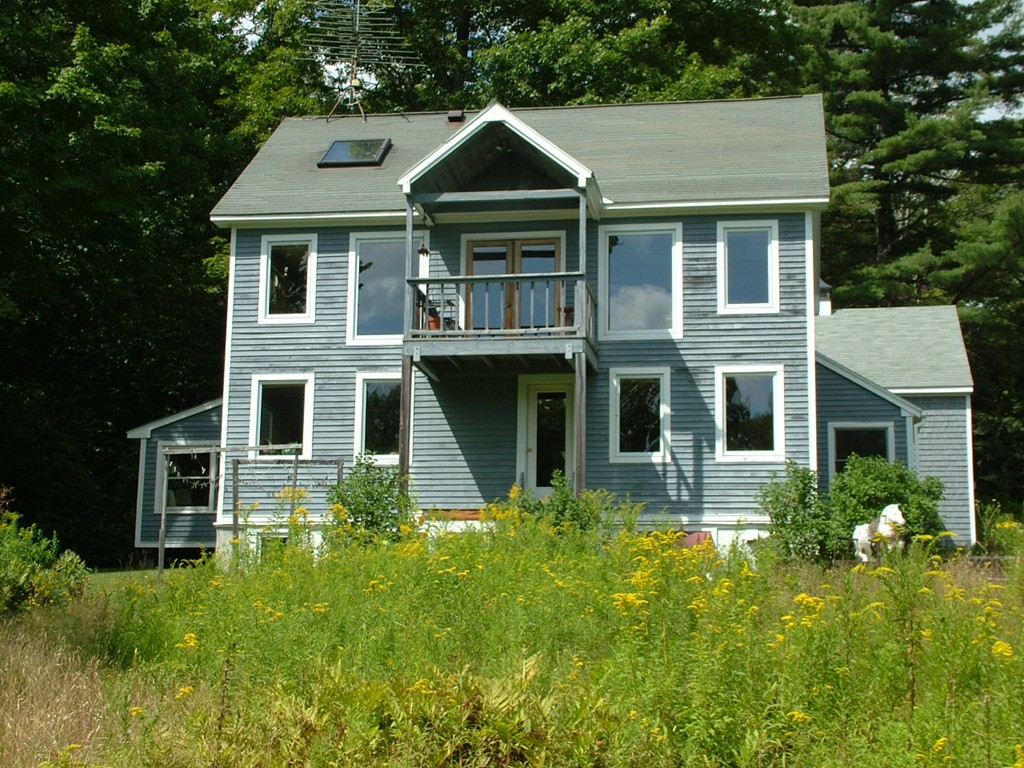 65 Potter Road Rowe, MA 01367 - Photo 3 of 30 a front view of a house with a yard