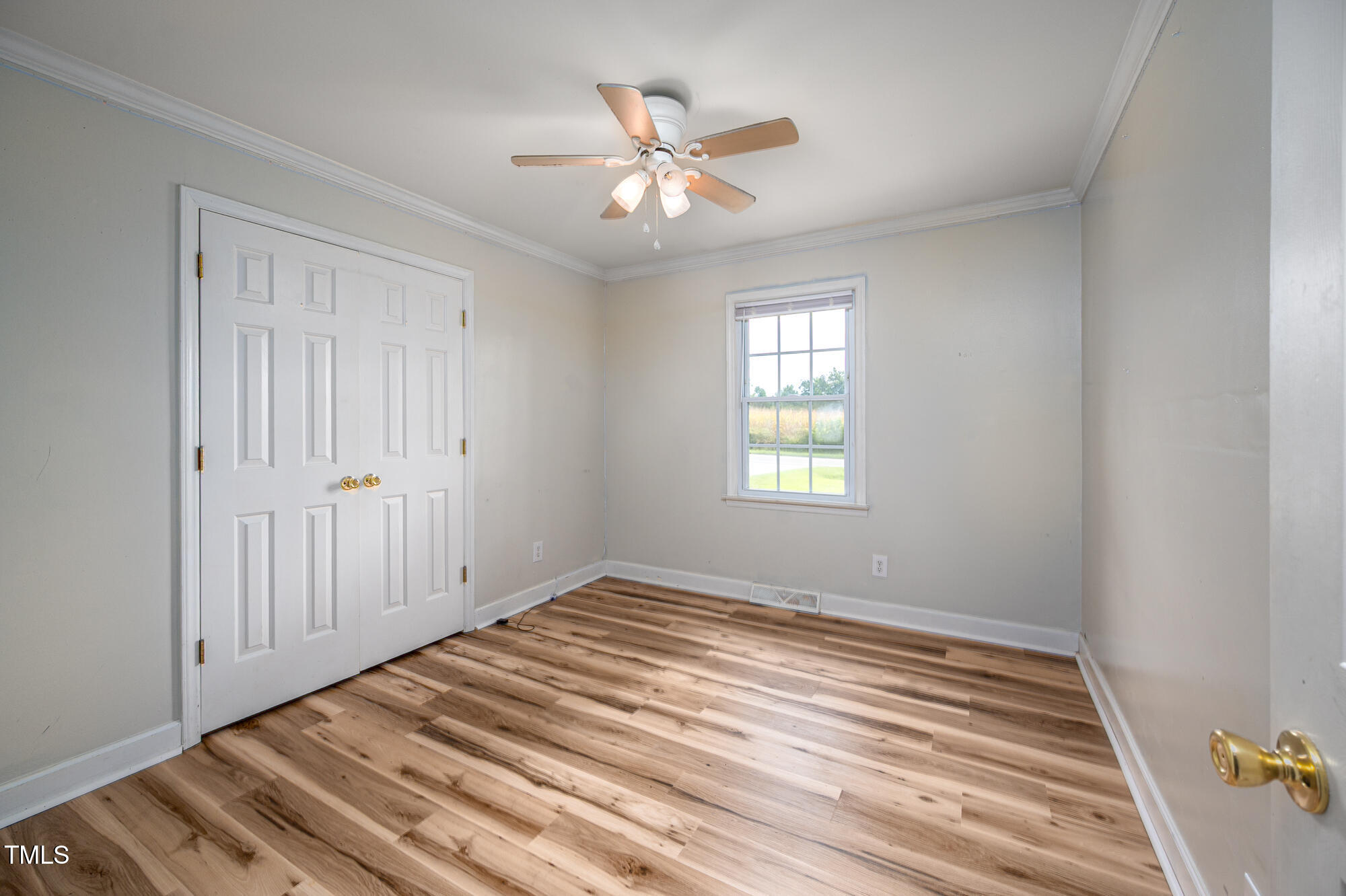 714 Dick Holeman Road Timberlake, NC 27583 - Photo 14 of 25 a view of an empty room with a window
