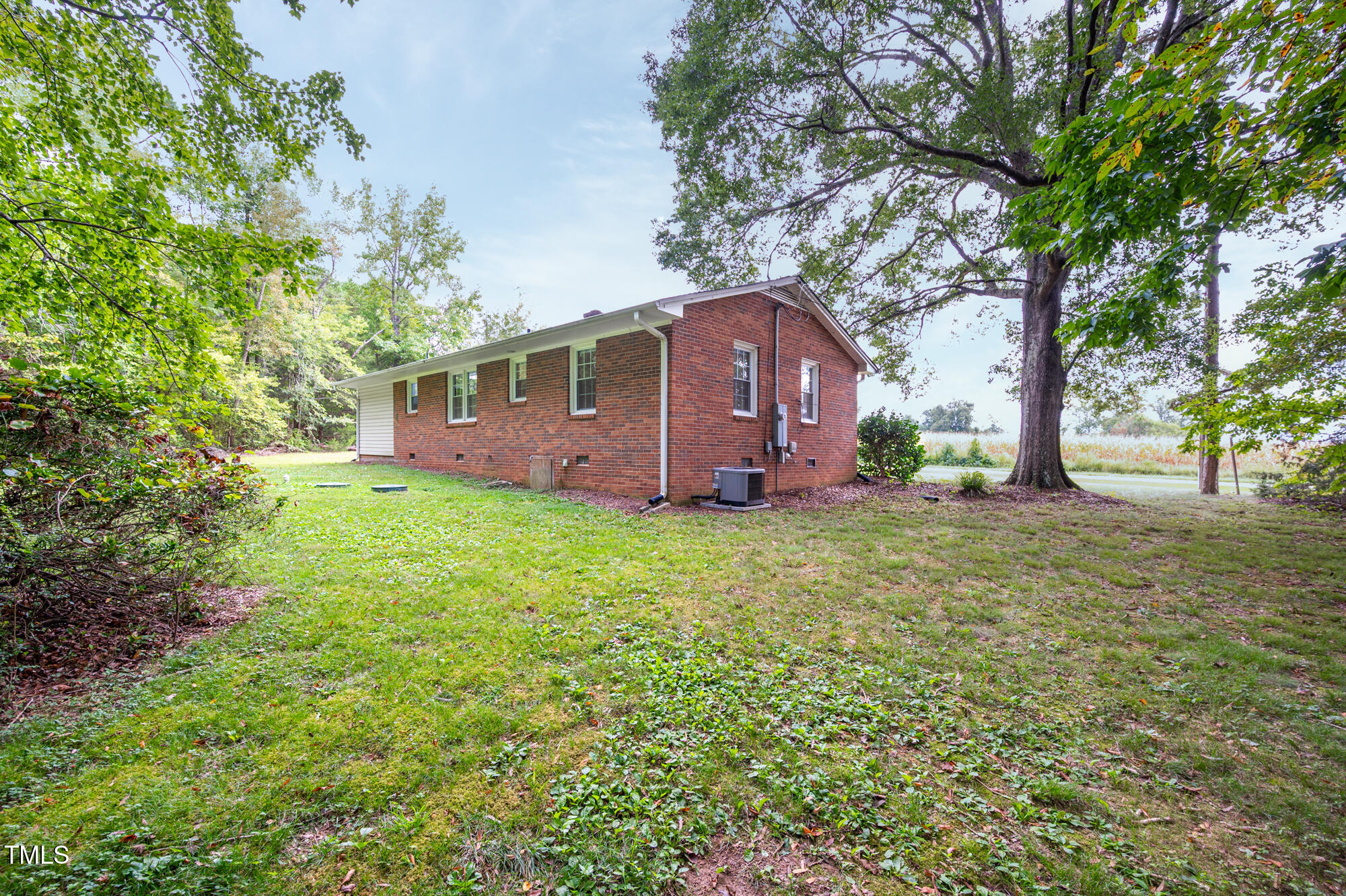 714 Dick Holeman Road Timberlake, NC 27583 - Photo 23 of 25 front view of a house with a yard