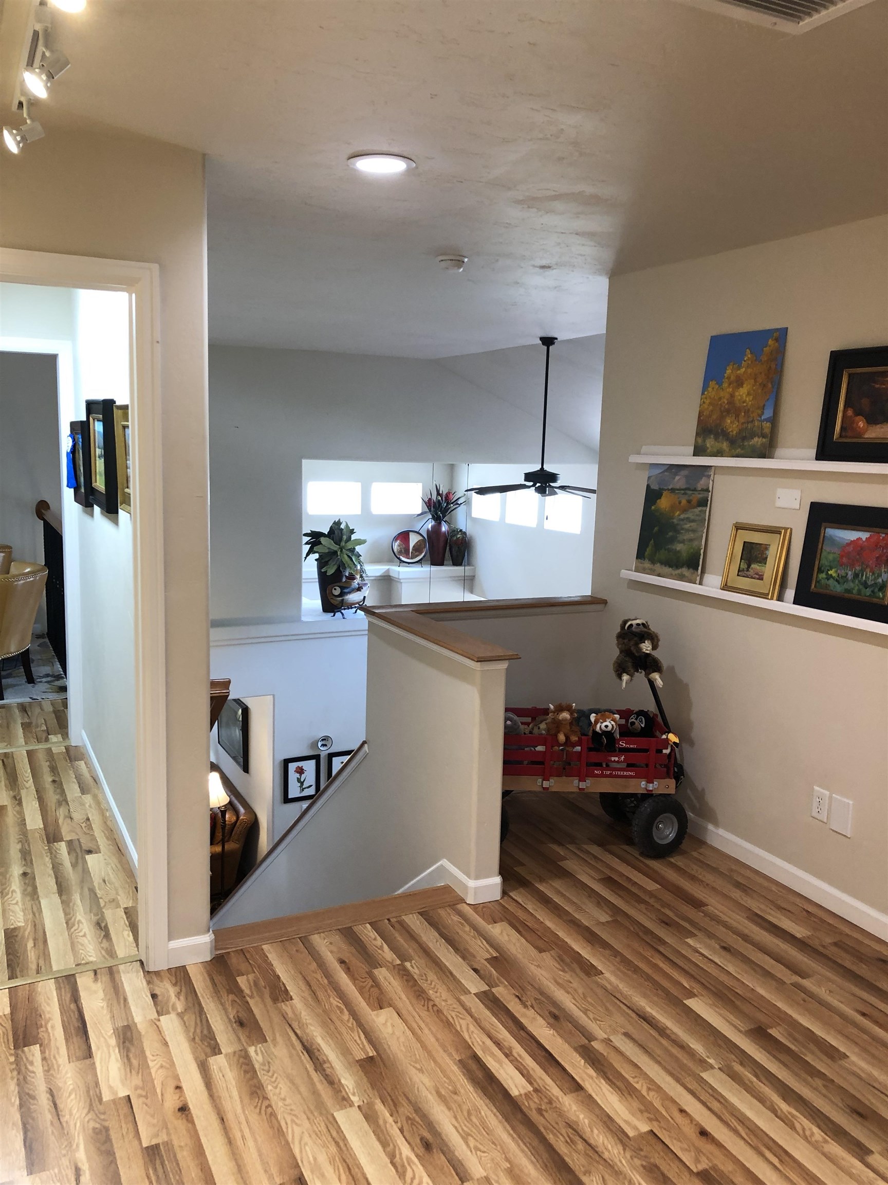 616 Saffron Way Grand Junction, CO 81505 - Photo 16 of 27 a bedroom with furniture and a book shelf