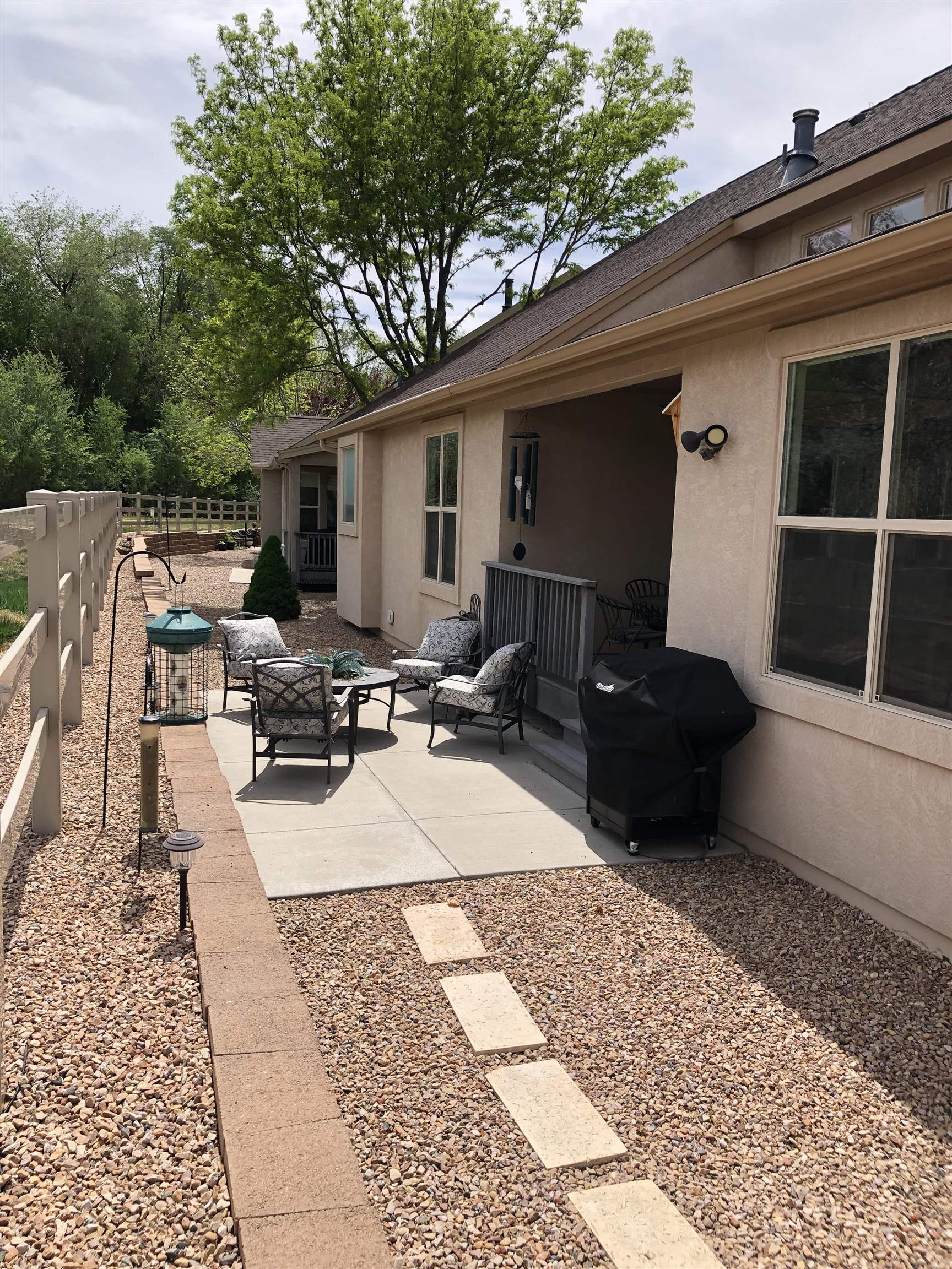 616 Saffron Way Grand Junction, CO 81505 - Photo 23 of 27 a view of a patio with chairs and potted plants
