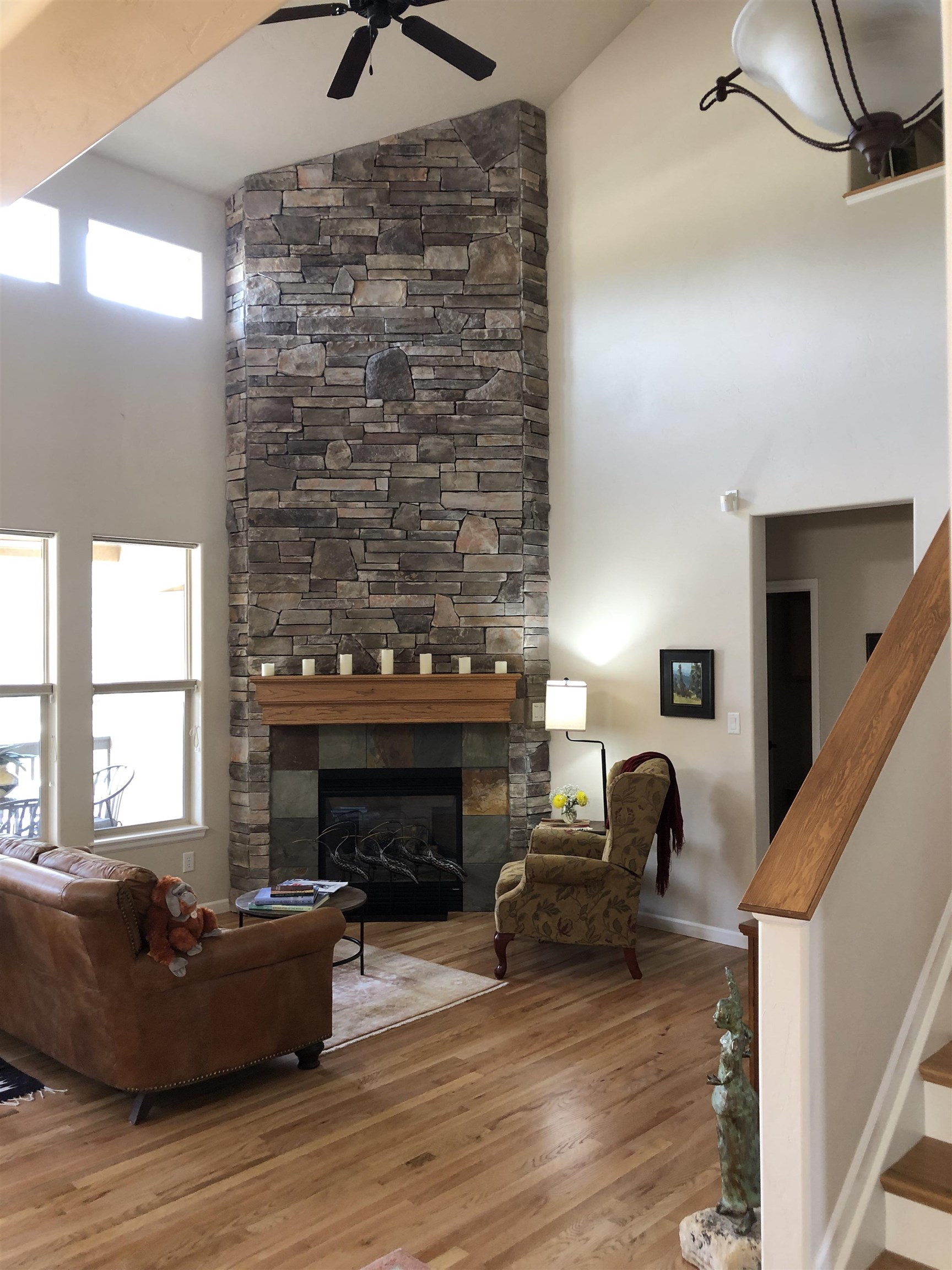 616 Saffron Way Grand Junction, CO 81505 - Photo 3 of 27 a living room with furniture and a fireplace