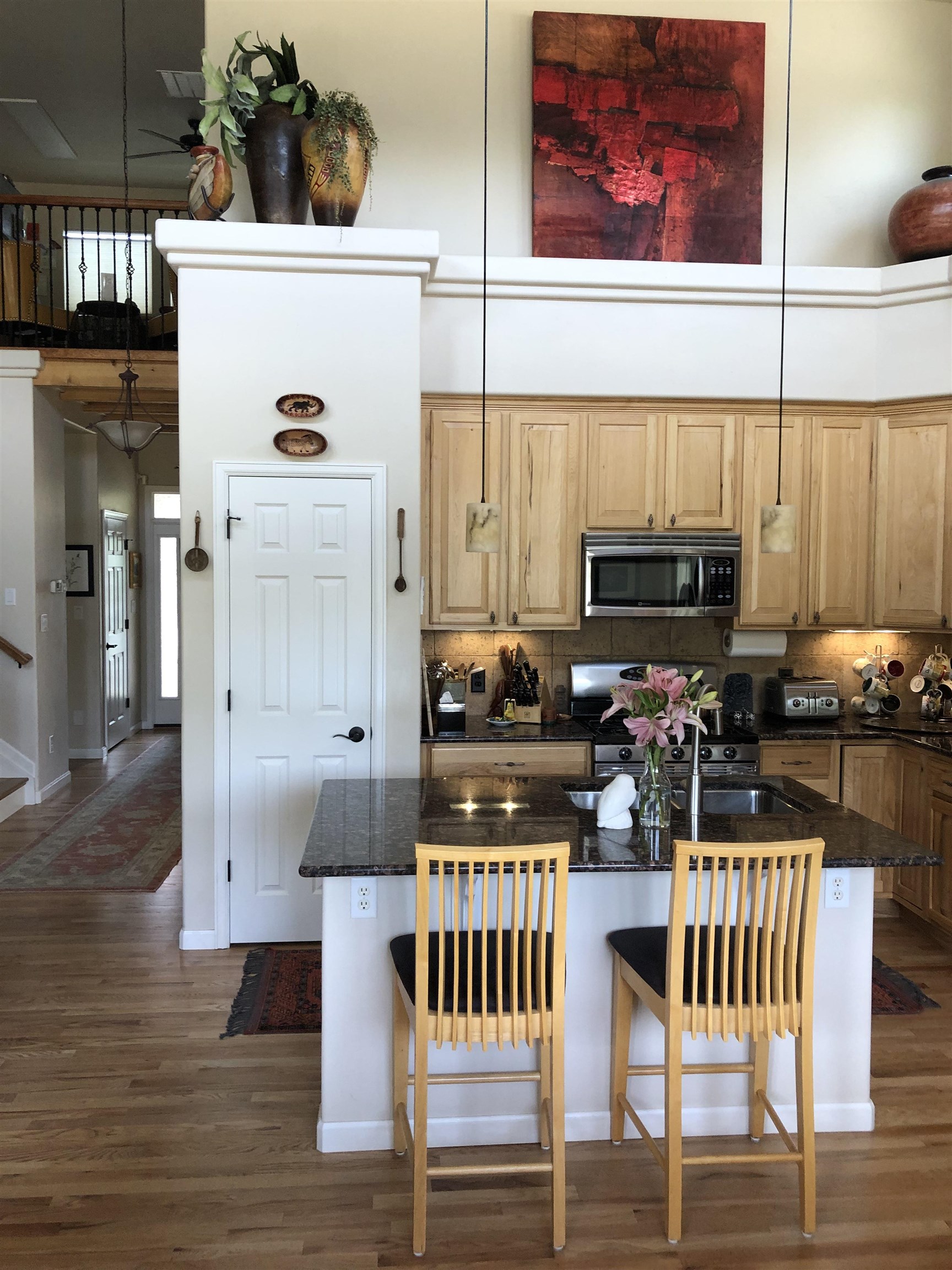 616 Saffron Way Grand Junction, CO 81505 - Photo 6 of 27 a view of kitchen with furniture and wooden floor