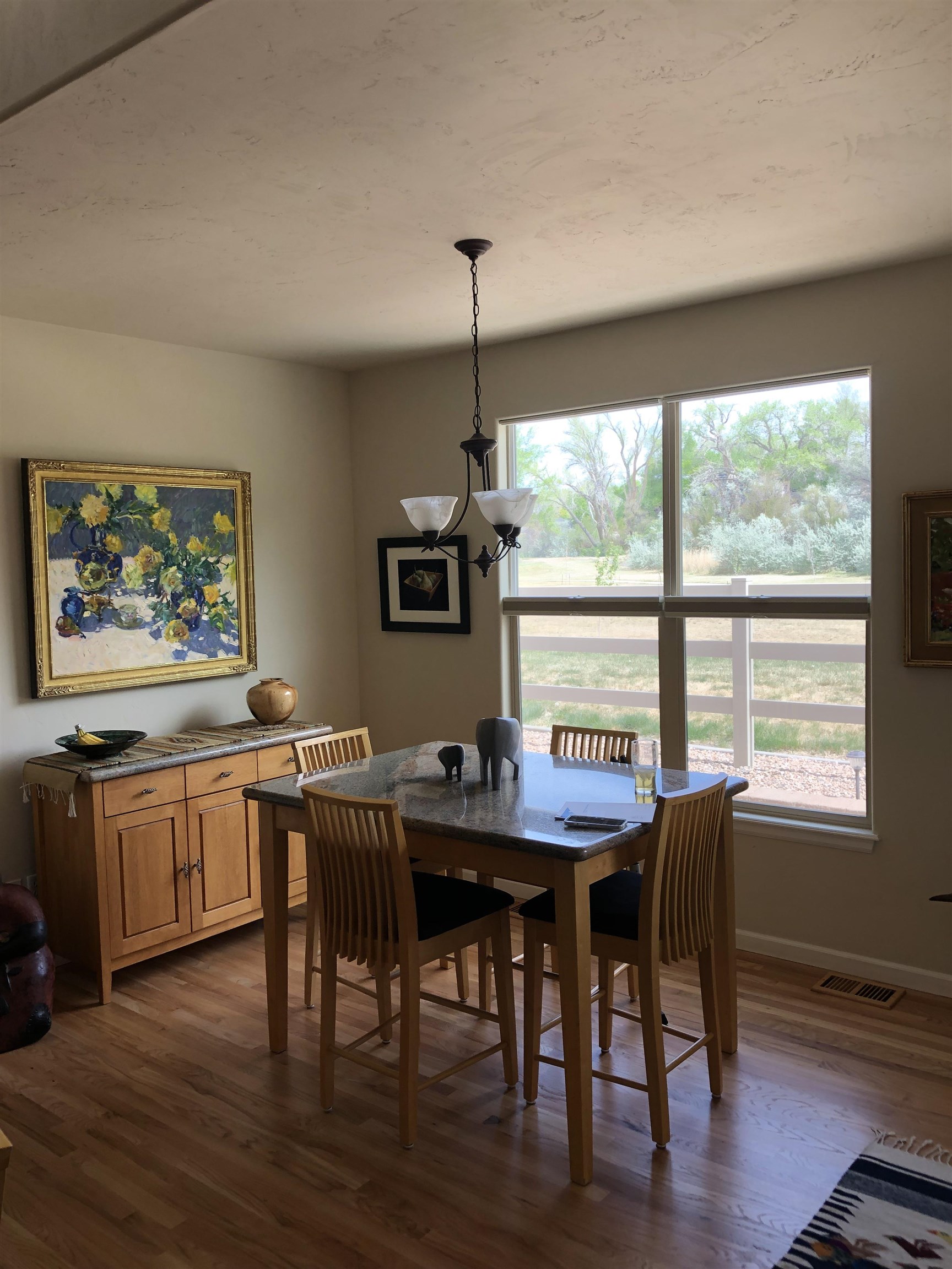 616 Saffron Way Grand Junction, CO 81505 - Photo 7 of 27 a dining room with furniture window wooden floor