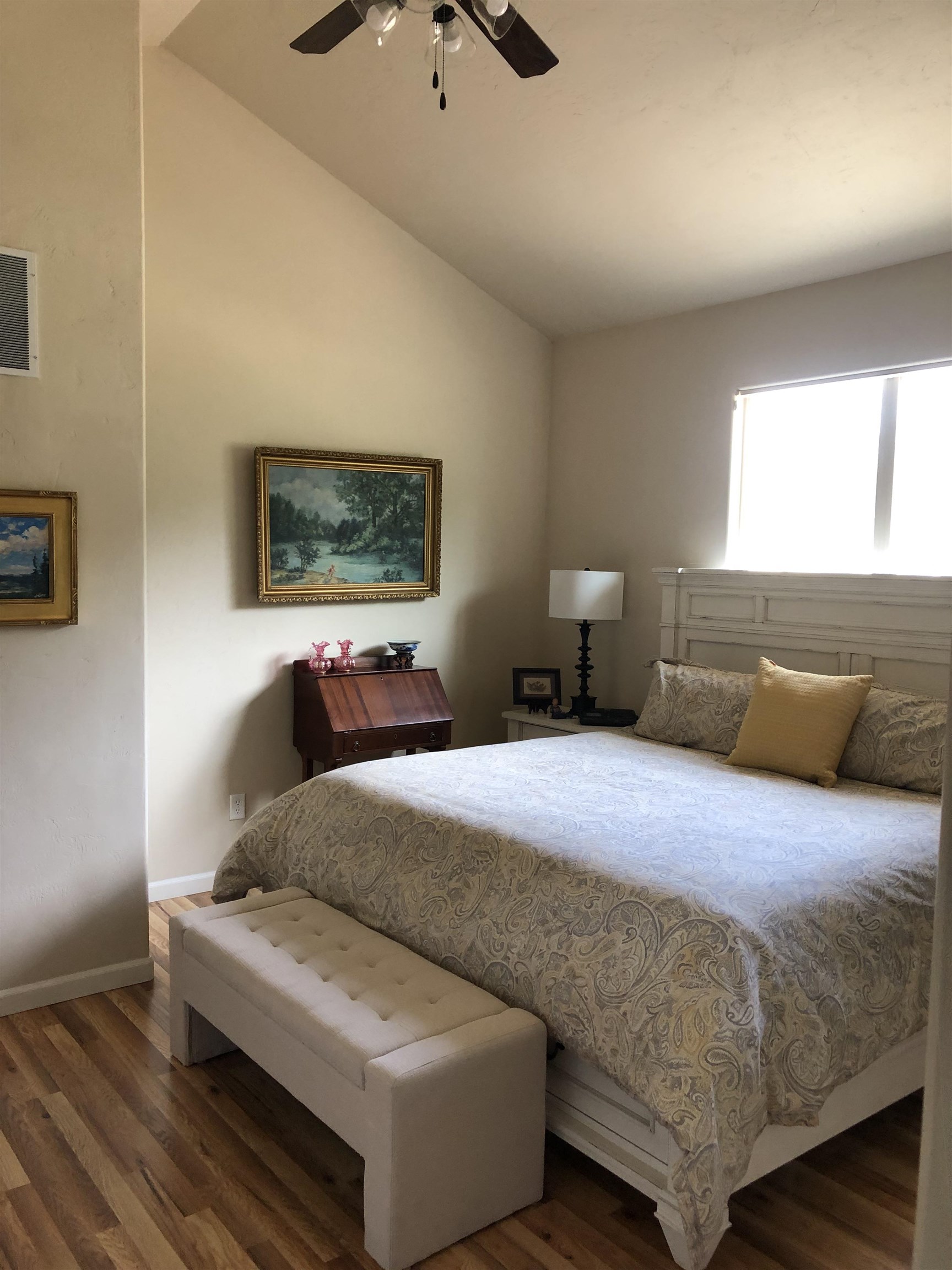 616 Saffron Way Grand Junction, CO 81505 - Photo 9 of 27 a bedroom with a bed and wooden floor