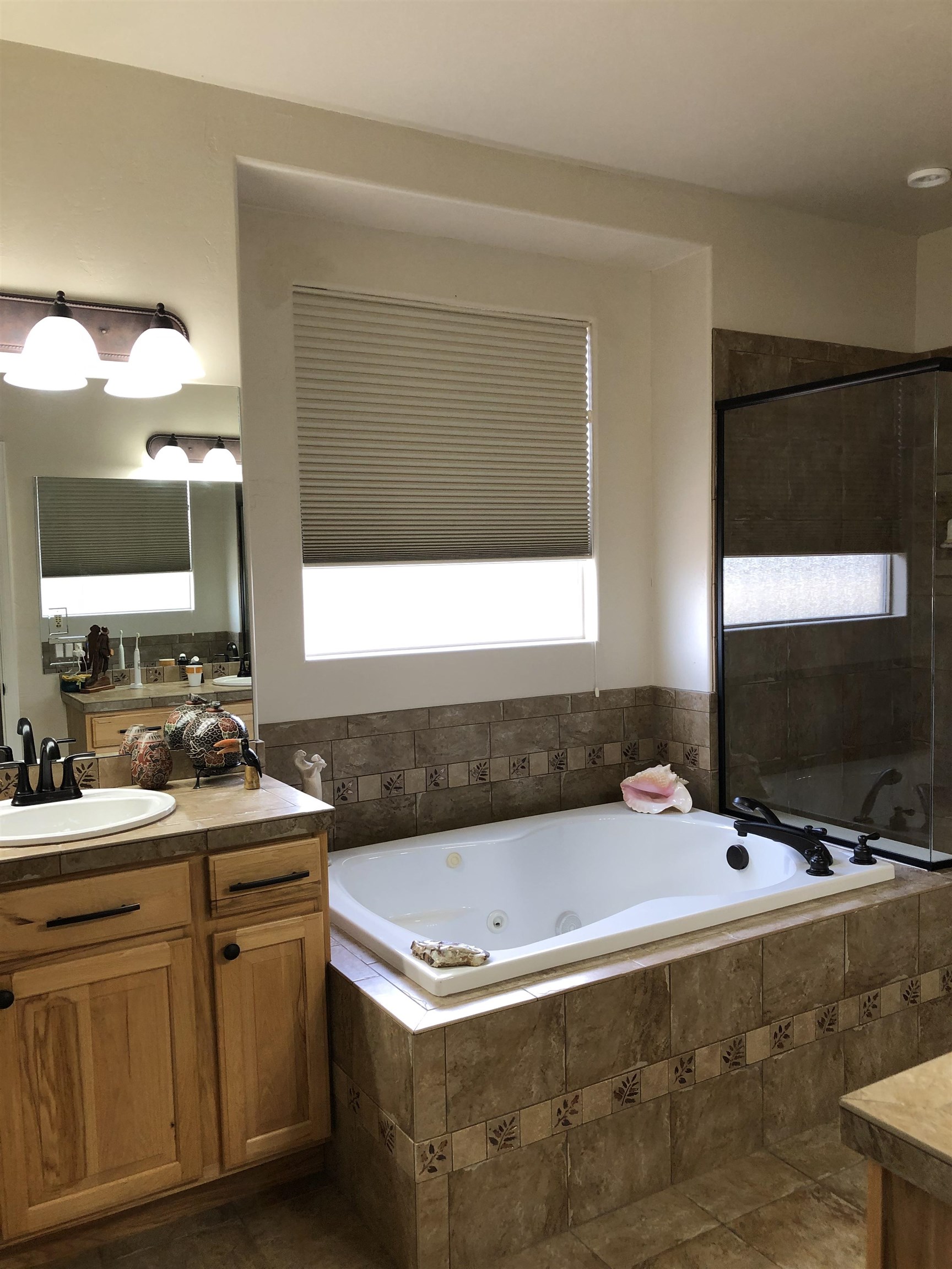 616 Saffron Way Grand Junction, CO 81505 - Photo 10 of 27 a bathroom with a sink and a mirror