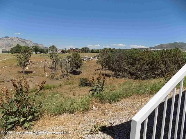 a view of a lake with a mountain in the background