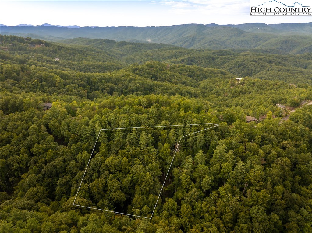 227 Red Cedar Road Boone, NC 28607 - Photo 6 of 50 a view of a mountain range with lush green forest
