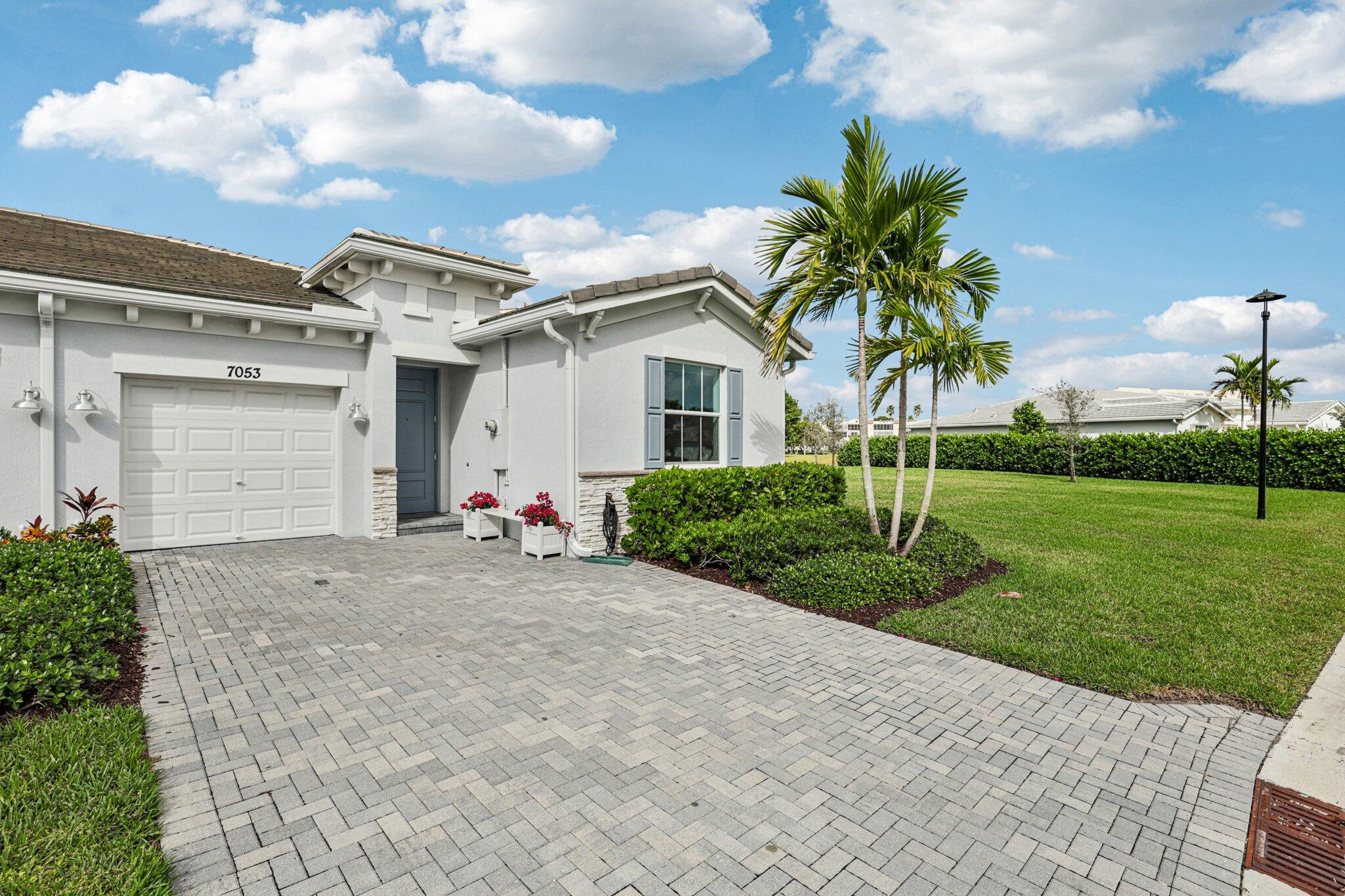 7053 Peters Lane Delray Beach, FL 33446 - Photo 2 of 62 2-web-or-mls-Peters Ln-S1912-002