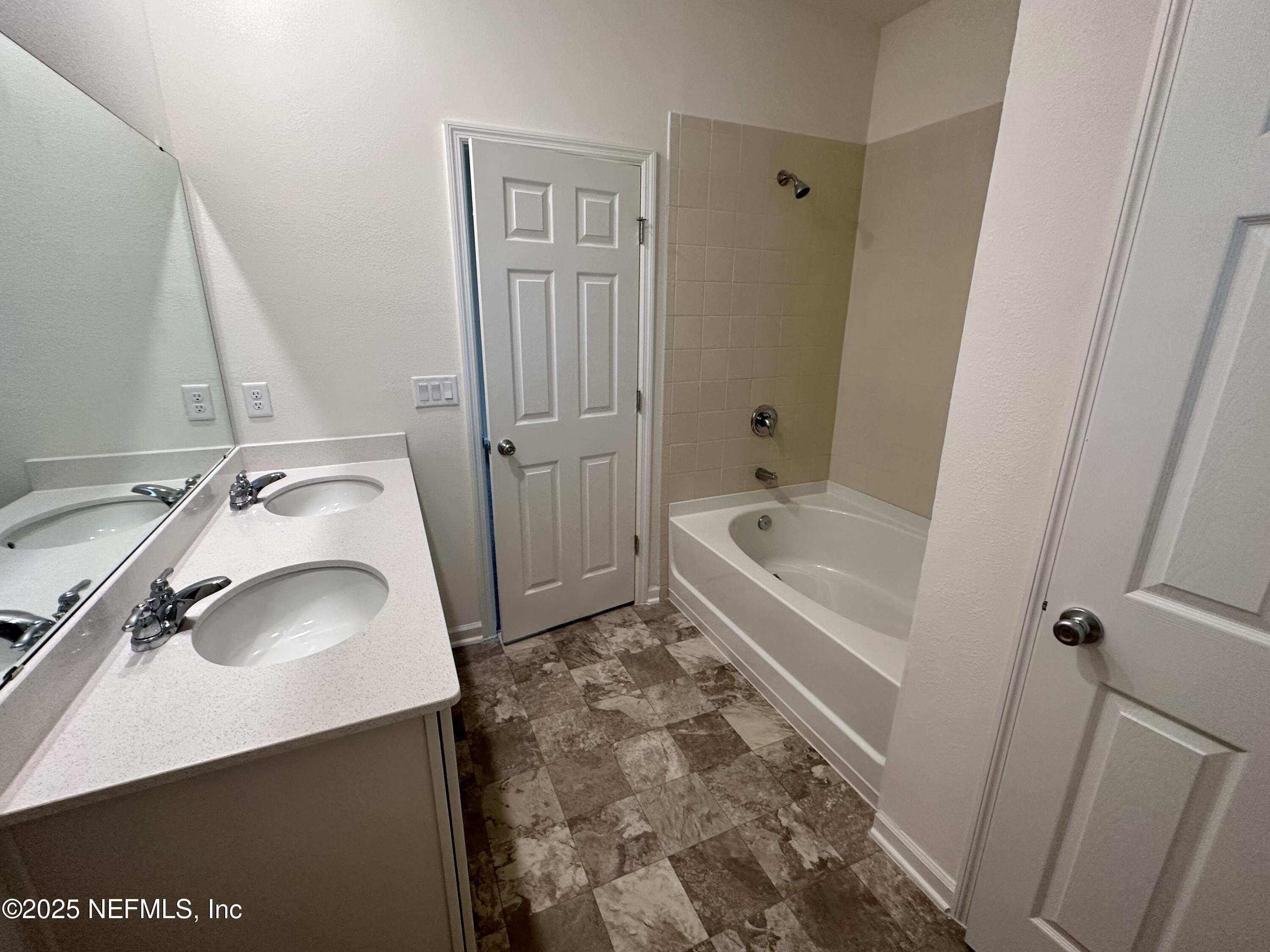 216 Rambling Brk Trail St. Johns, FL 32259 - Photo 13 of 24 a bathroom with a sink and a tub