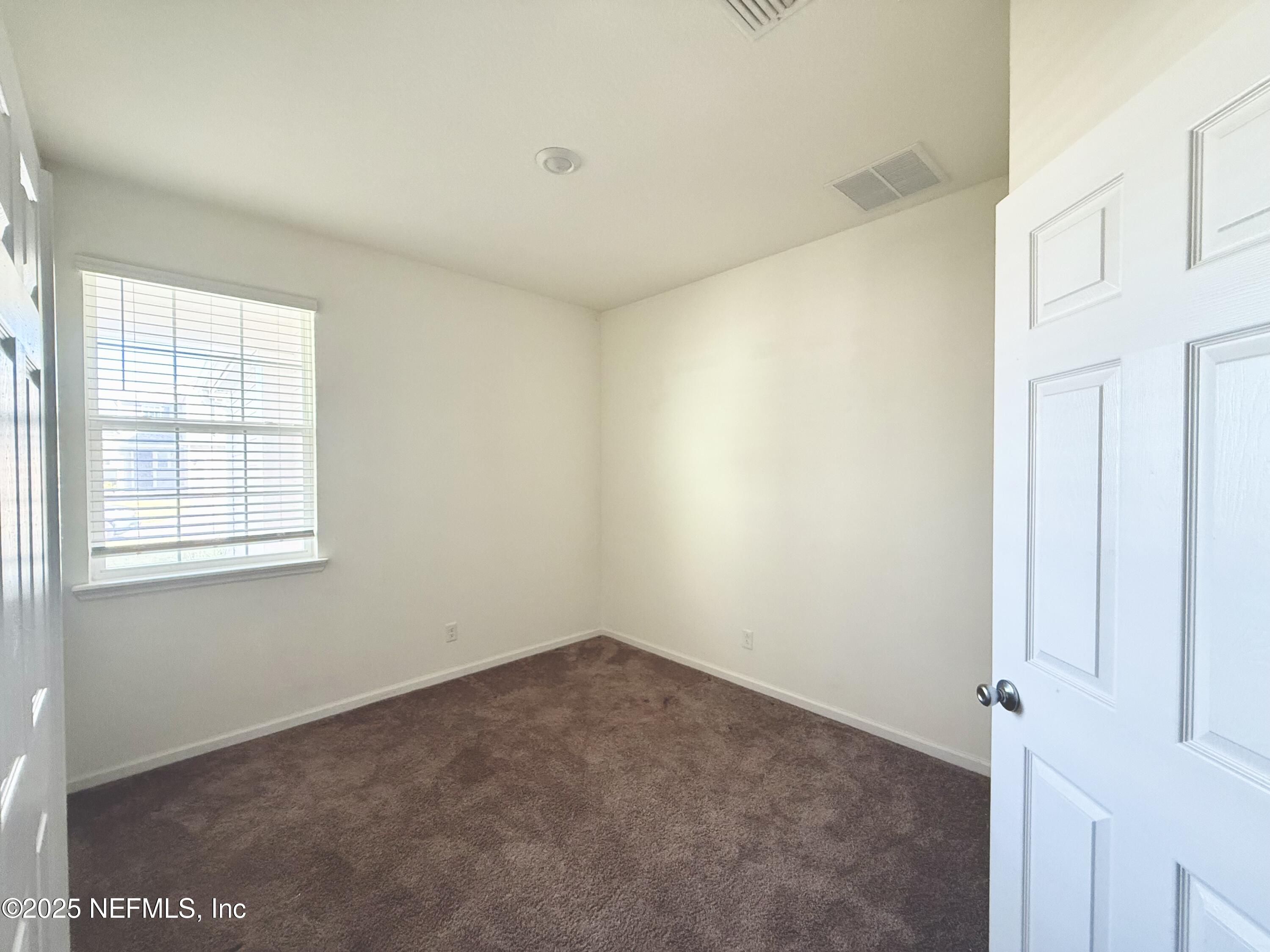 216 Rambling Brk Trail St. Johns, FL 32259 - Photo 15 of 24 a view of a room that has a window in it