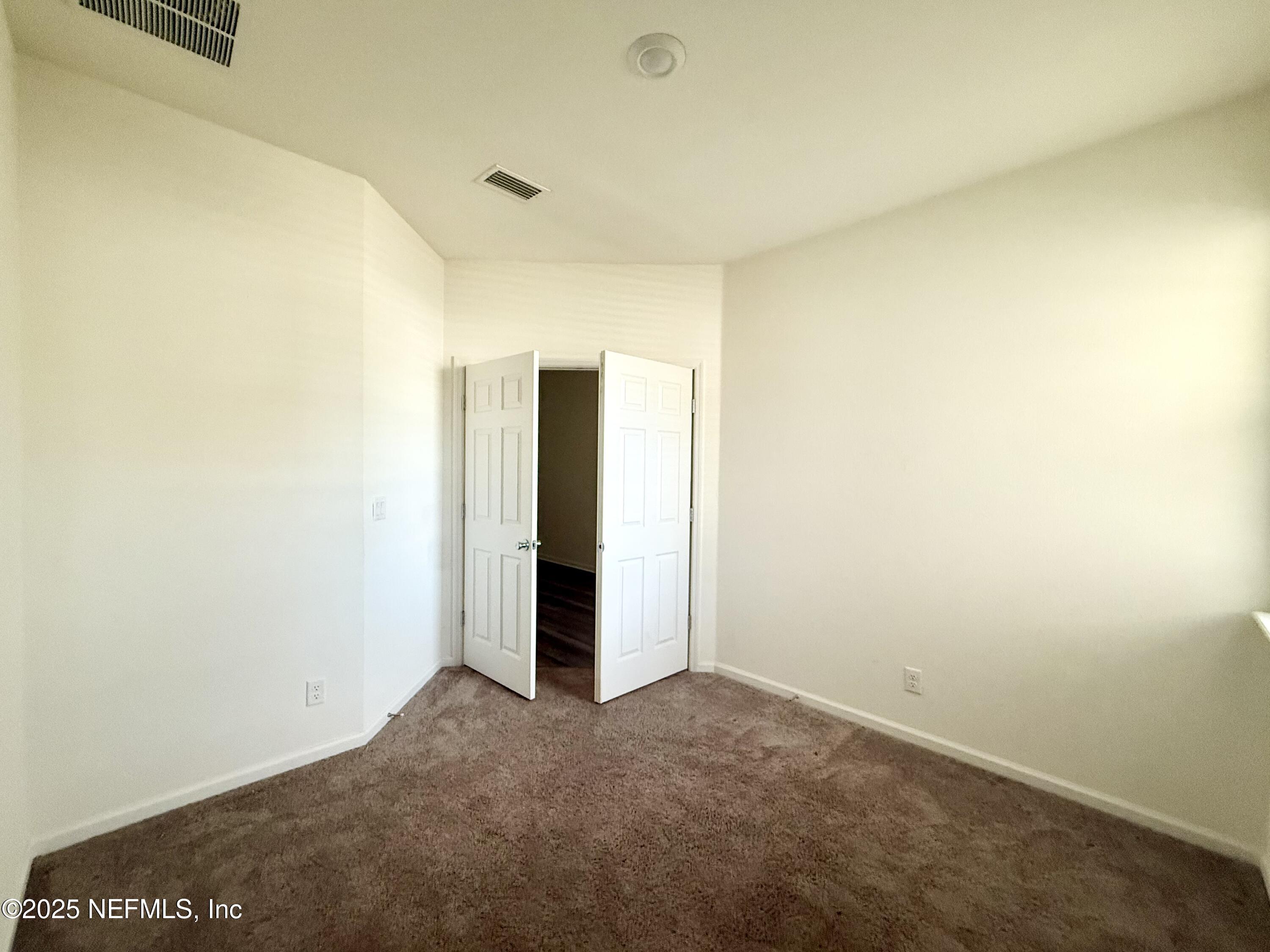 216 Rambling Brk Trail St. Johns, FL 32259 - Photo 16 of 24 a view of an empty room