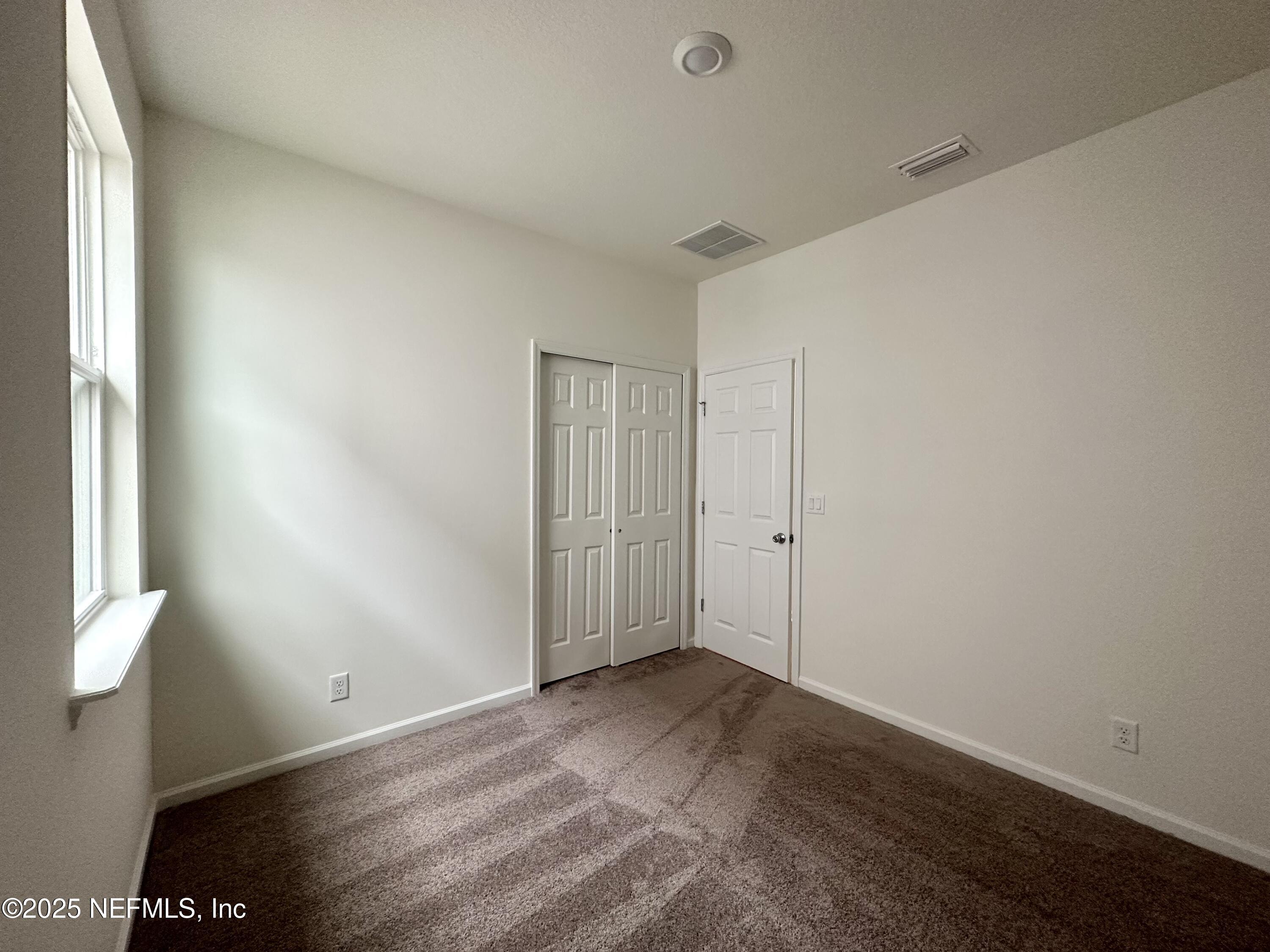 216 Rambling Brk Trail St. Johns, FL 32259 - Photo 18 of 24 a view of an empty room