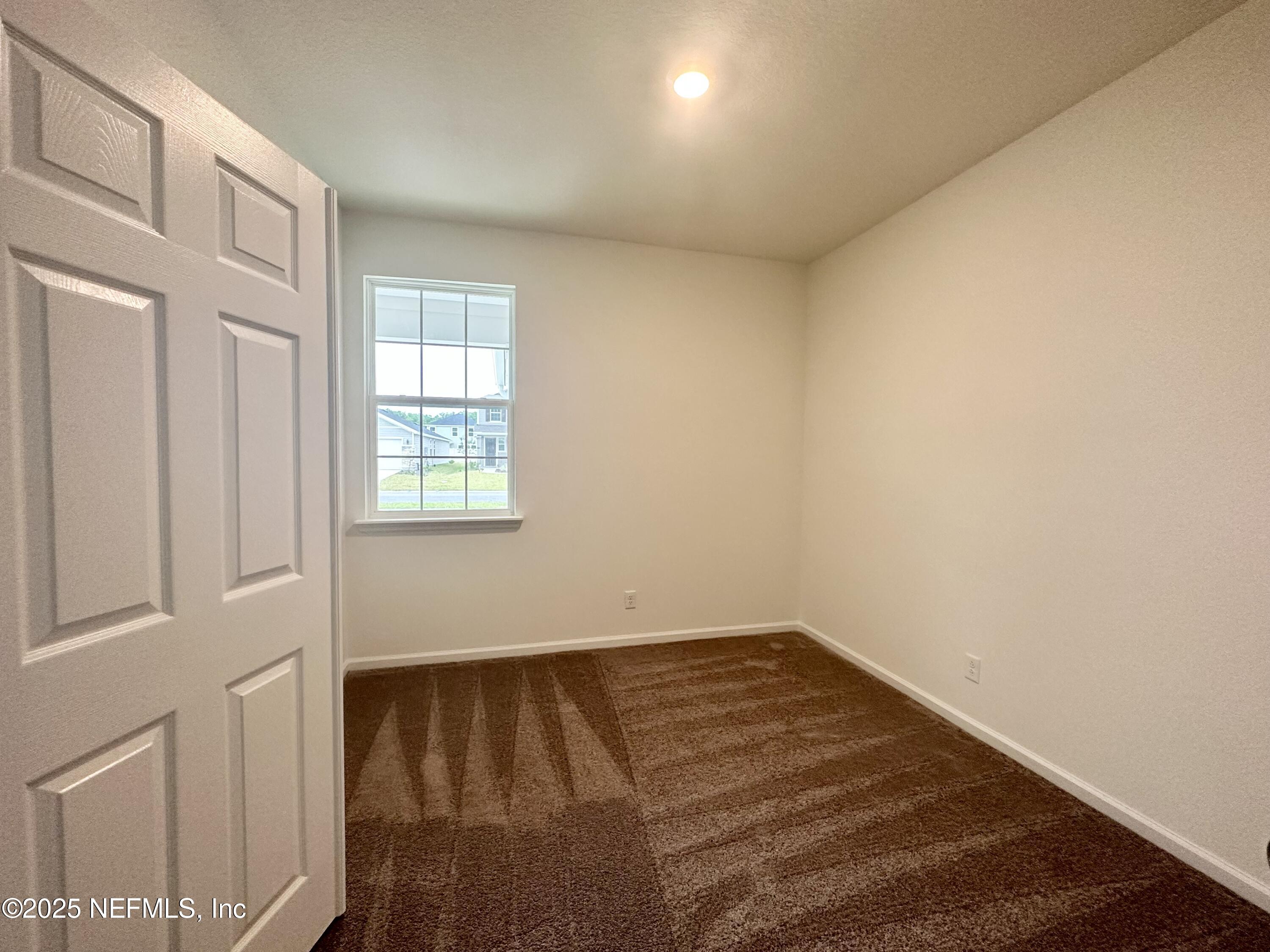 216 Rambling Brk Trail St. Johns, FL 32259 - Photo 19 of 24 an empty room with windows