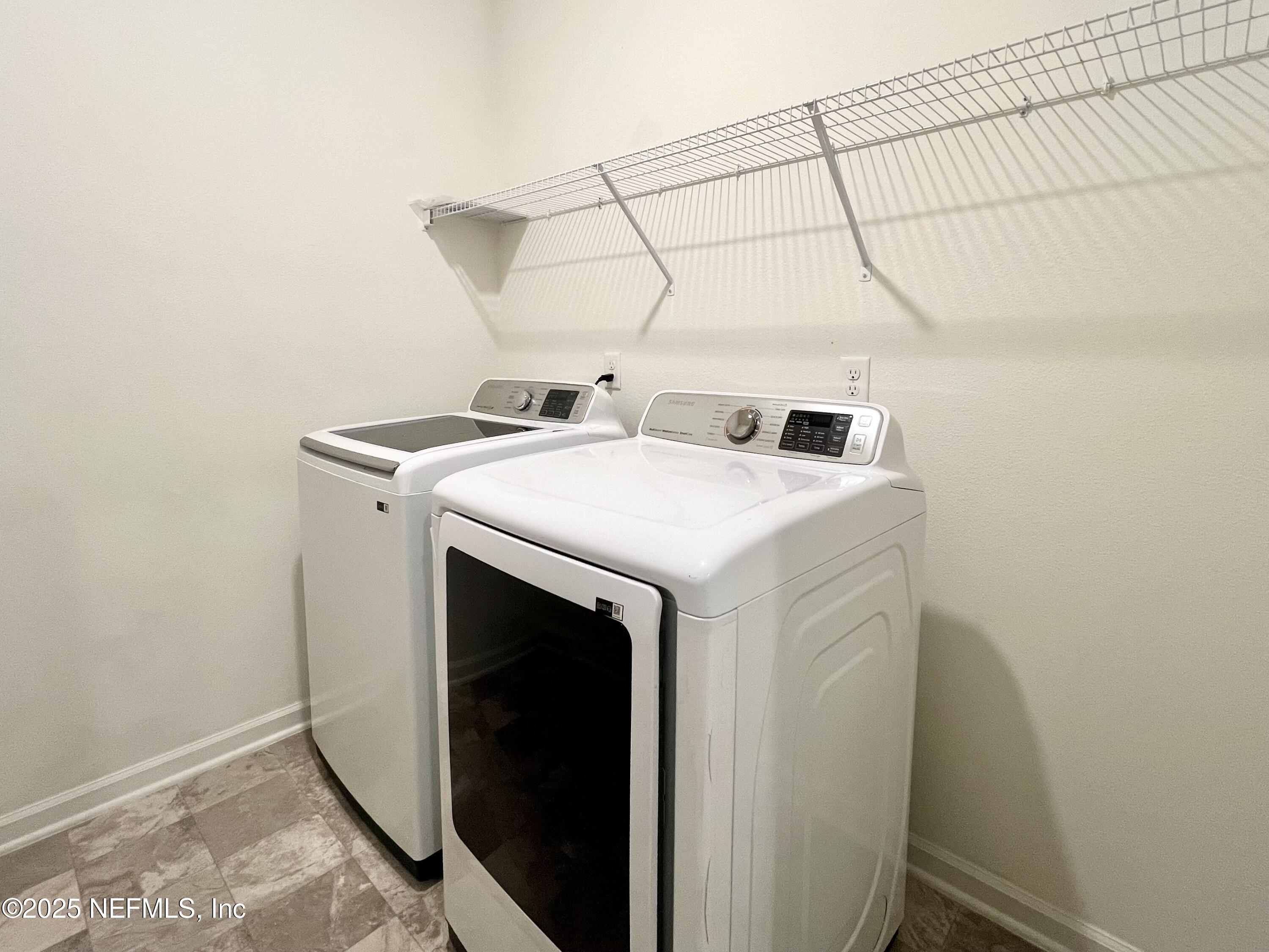 216 Rambling Brk Trail St. Johns, FL 32259 - Photo 21 of 24 a utility room with dryer and washer