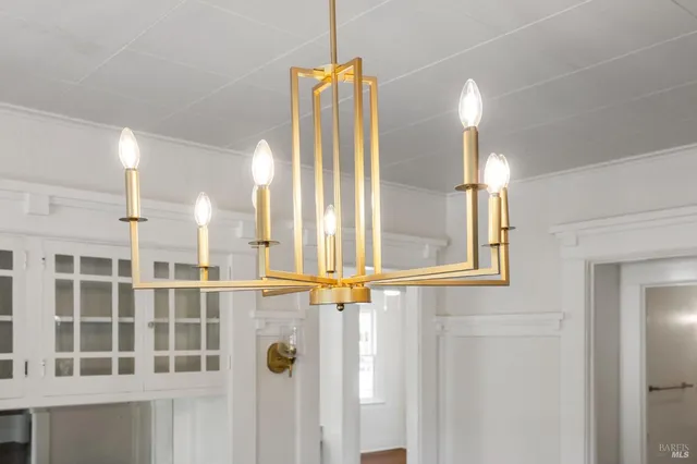 a kitchen with stainless steel appliances a refrigerator sink and cabinets