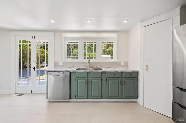 a kitchen with a sink and window