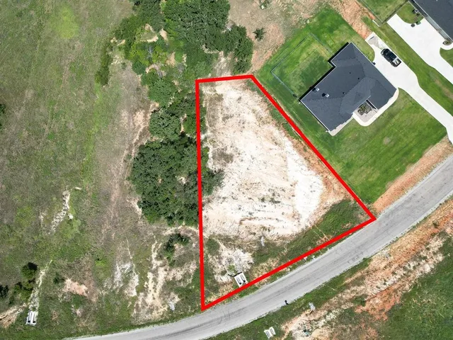 a view of a yard with an umbrella