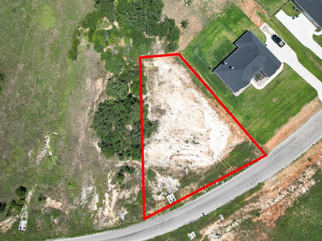 a view of a yard with an umbrella