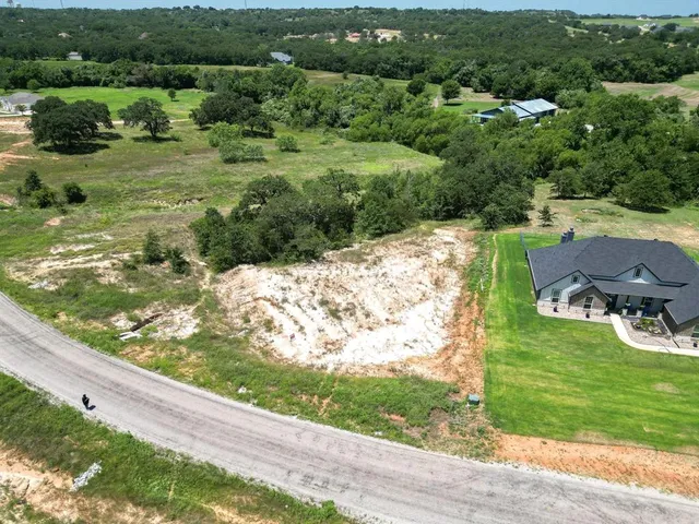 a view of a garden with a lake
