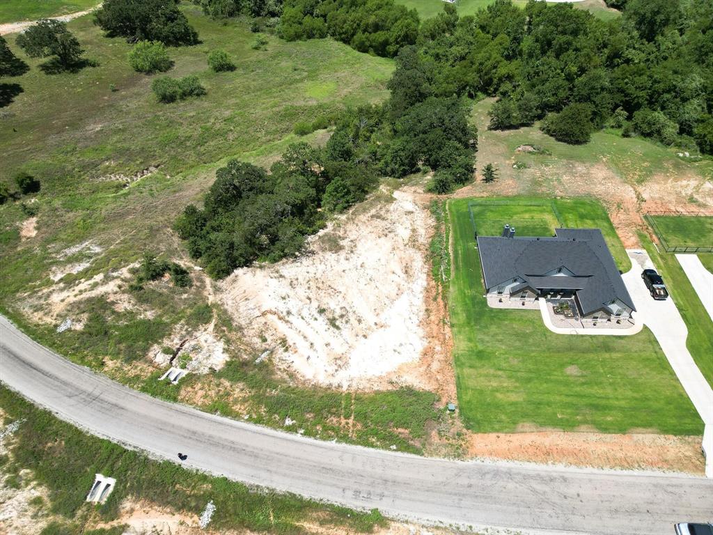 1077 Gonzollas Road Springtown, TX 76082 - Photo 10 of 16 a view of a yard with potted plants