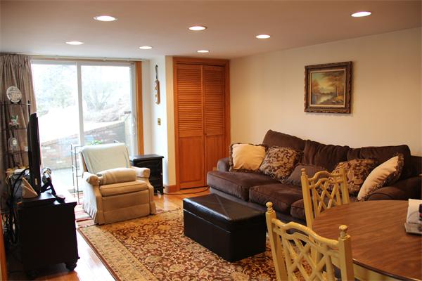 23 Marble Road Gloucester, MA 01930 - Photo 11 of 16 a living room with furniture wooden floor and a large window