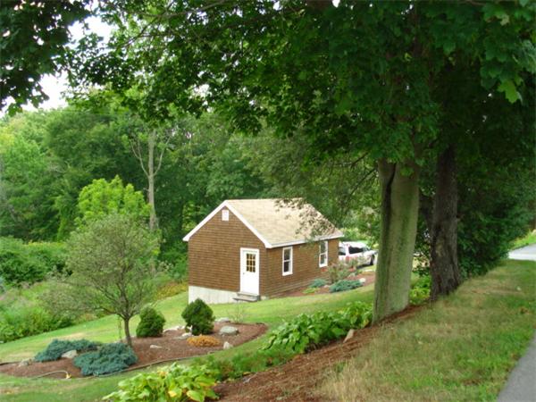 23 Marble Road Gloucester, MA 01930 - Photo 2 of 16 a front view of a house with a yard