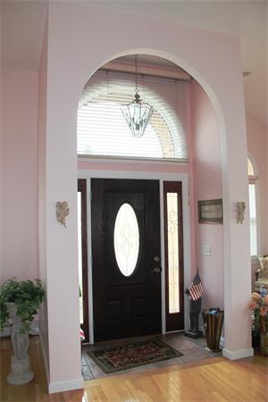 23 Marble Road Gloucester, MA 01930 - Photo 3 of 16 a living room with a mirror and a table
