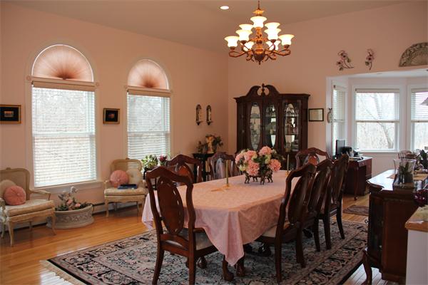 23 Marble Road Gloucester, MA 01930 - Photo 5 of 16 a view of a dining room with furniture and chandelier