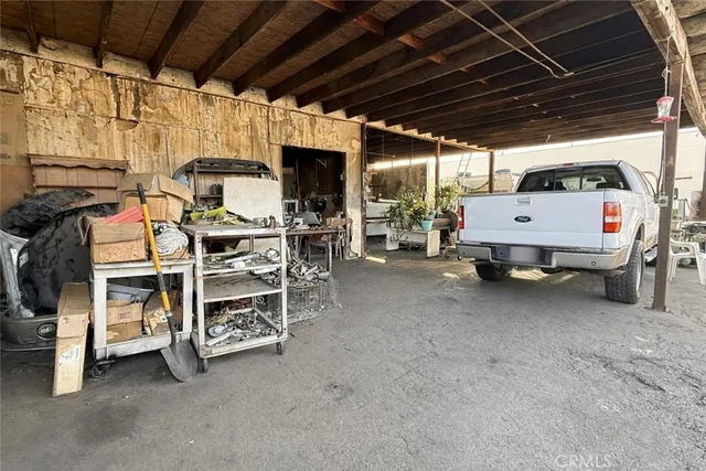 a view of a room with wooden ceiling