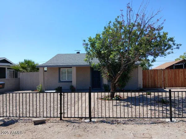 a front view of a house having yard