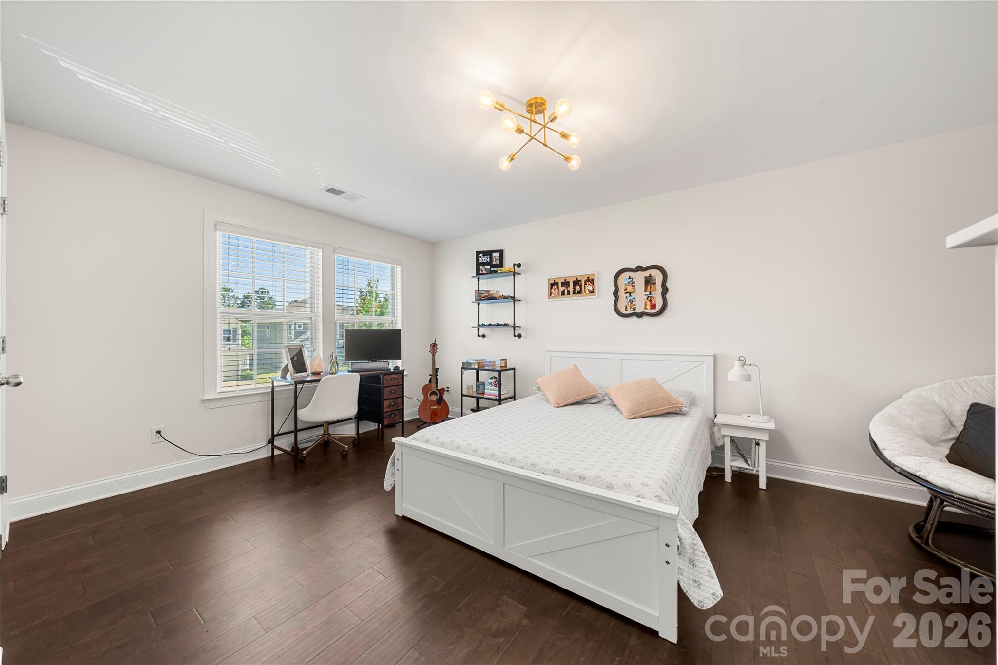 11266 Trailside Road Concord, NC 28027 - Photo 26 of 48 a bedroom with a bed couch and a window