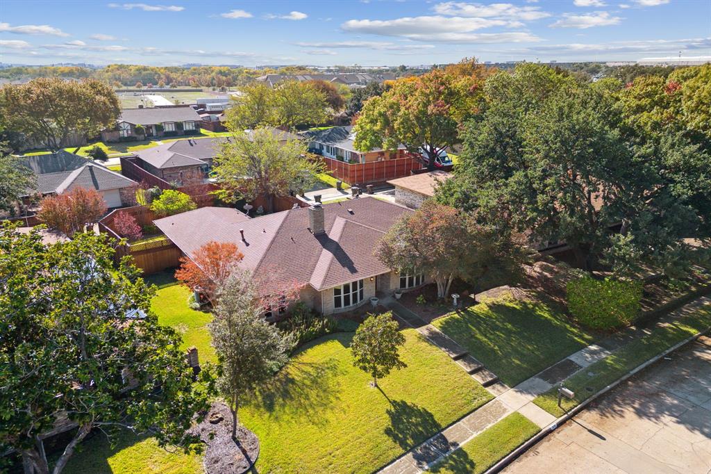 3116 Robin Road Plano, TX 75075 - Photo 1 of 1 an aerial view of residential houses with yard