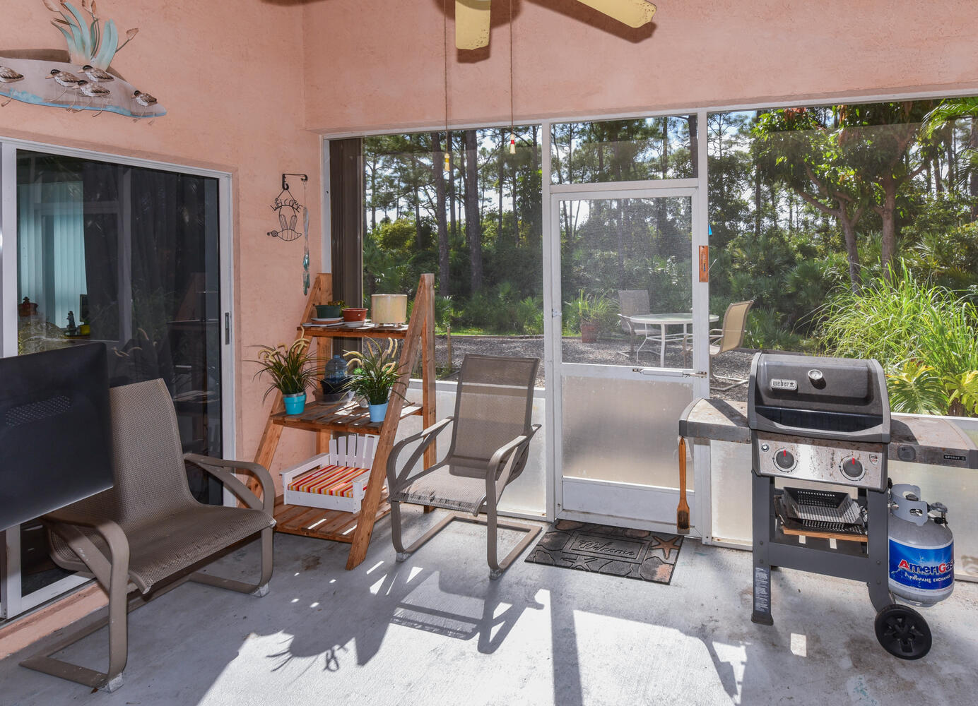 7922 Southeast Sugar Pines Way Hobe Sound, FL 33455 - Photo 22 of 31 Covered/Screened Patio