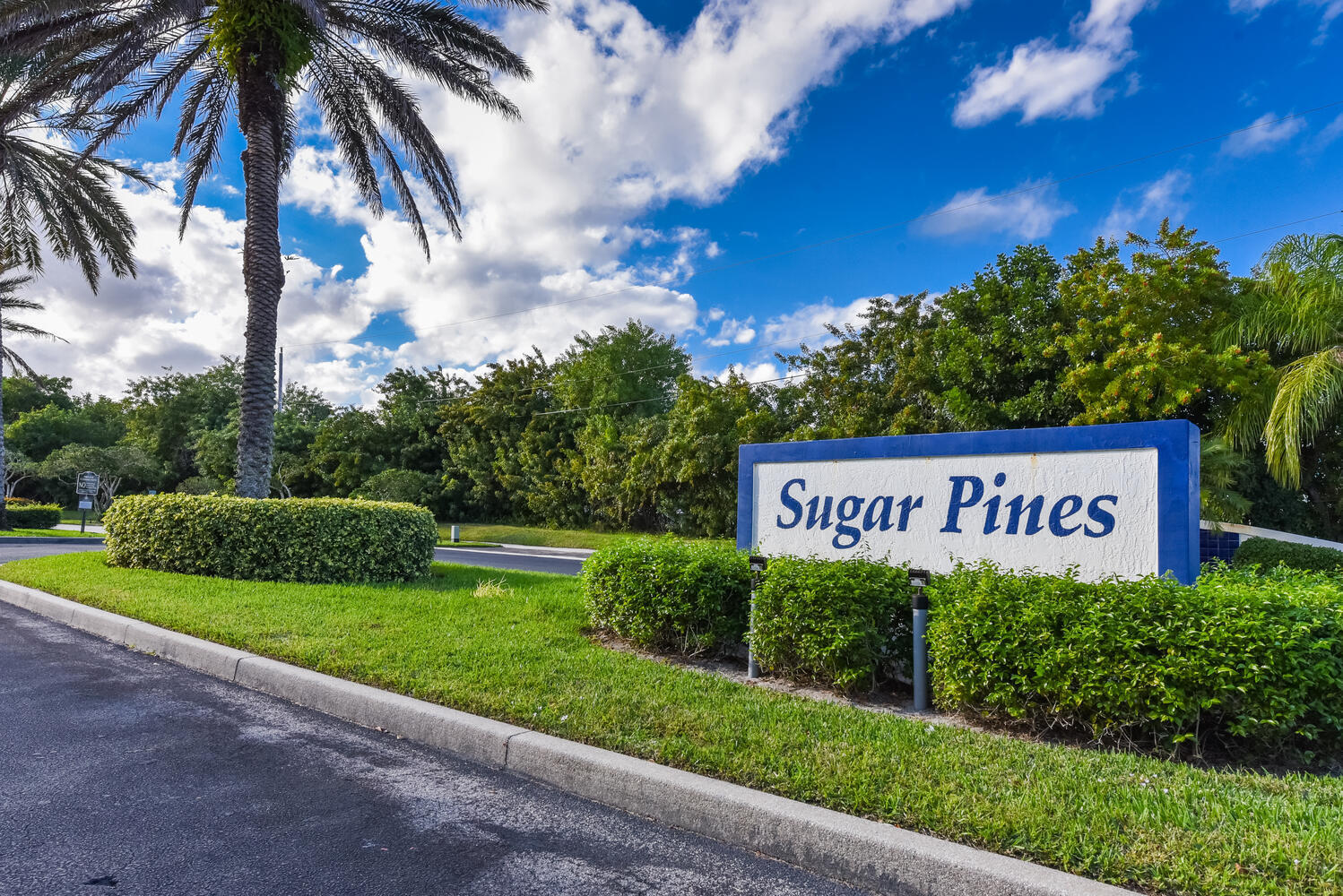 7922 Southeast Sugar Pines Way Hobe Sound, FL 33455 - Photo 26 of 31 Sugar Pines Community Sign