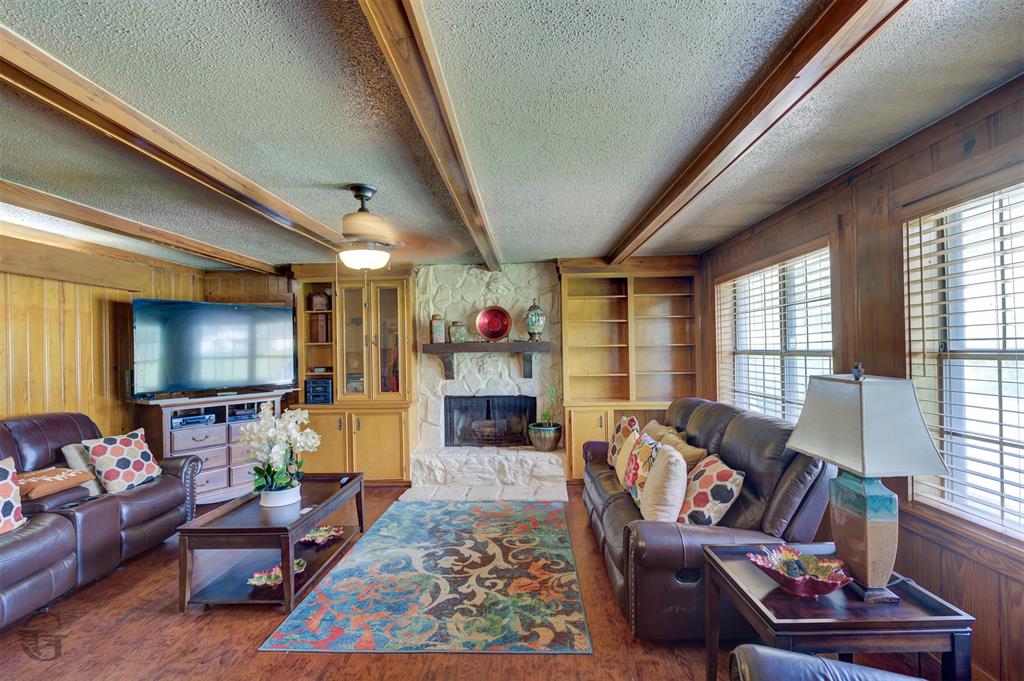 5909 Yarbrough Road Shreveport, LA 71119 - Photo 7 of 19 a living room with furniture fireplace and a large window