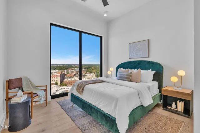 a bedroom with a bed and wall