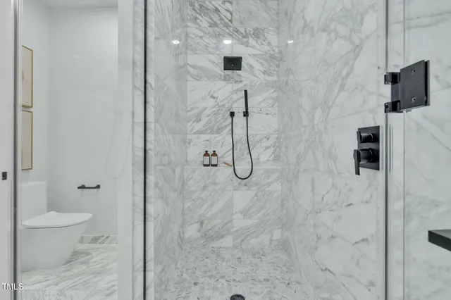 a view of balcony with wooden floor and fence