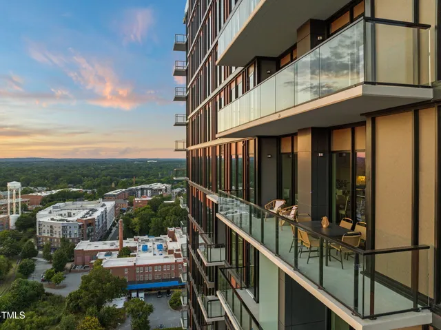 a view of a swimming pool with outdoor seating