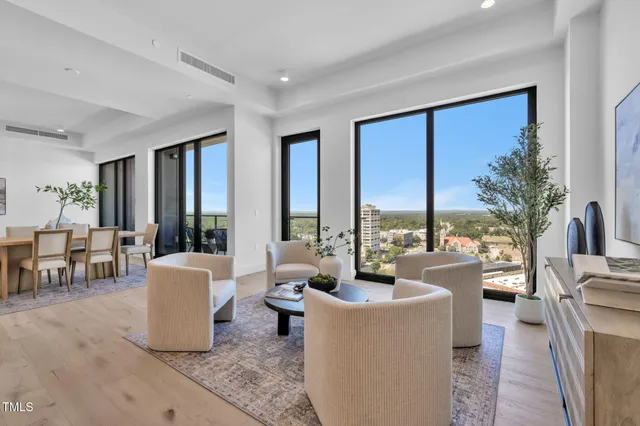 a kitchen with stainless steel appliances granite countertop a stove and a refrigerator