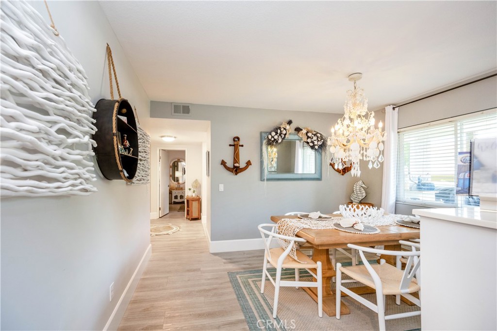 68 Corniche Drive, Unit B Dana Point, CA 92629 - Photo 11 of 35 a dining room with furniture and window