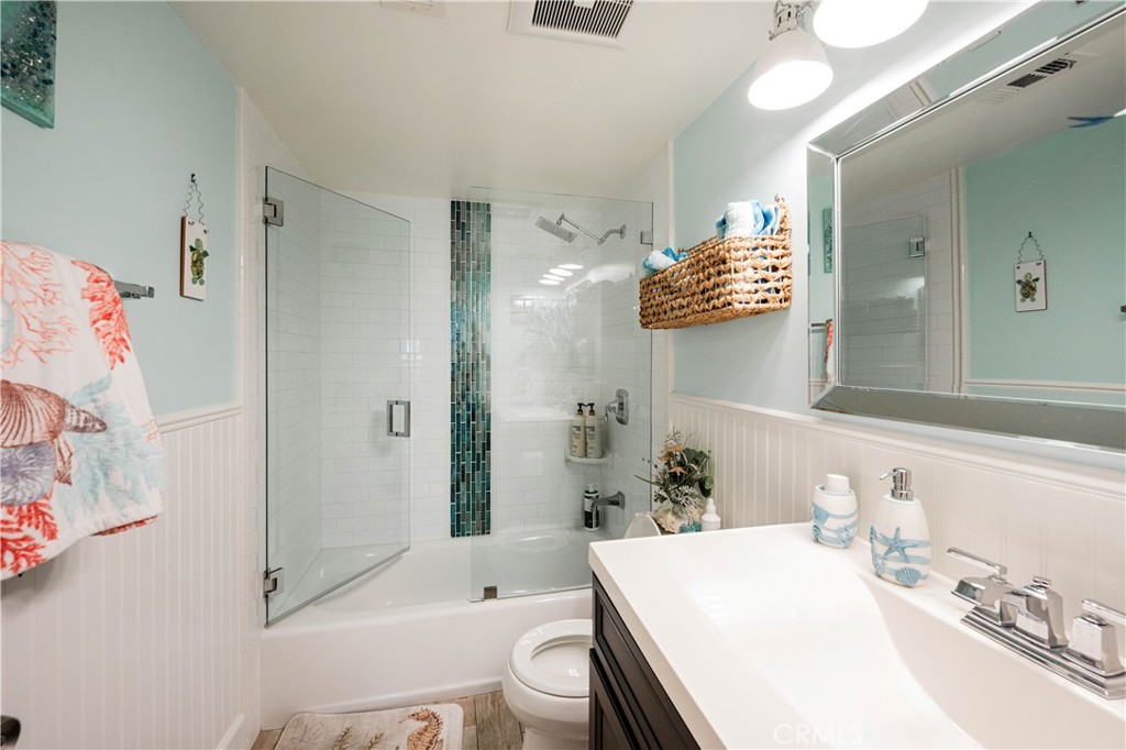 68 Corniche Drive, Unit B Dana Point, CA 92629 - Photo 26 of 35 a bathroom with a sink a toilet and shower