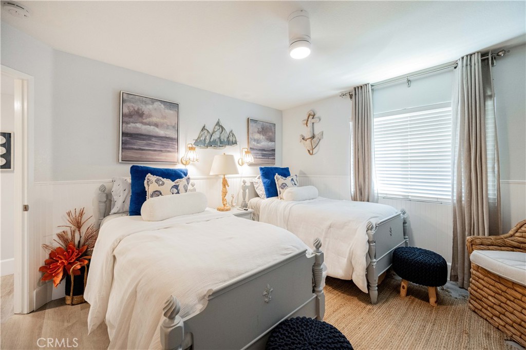 68 Corniche Drive, Unit B Dana Point, CA 92629 - Photo 27 of 35 a bedroom with 2 bed and a window